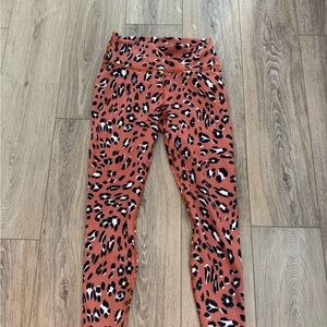 Fabletics Orange and Black PowerHold Leggings